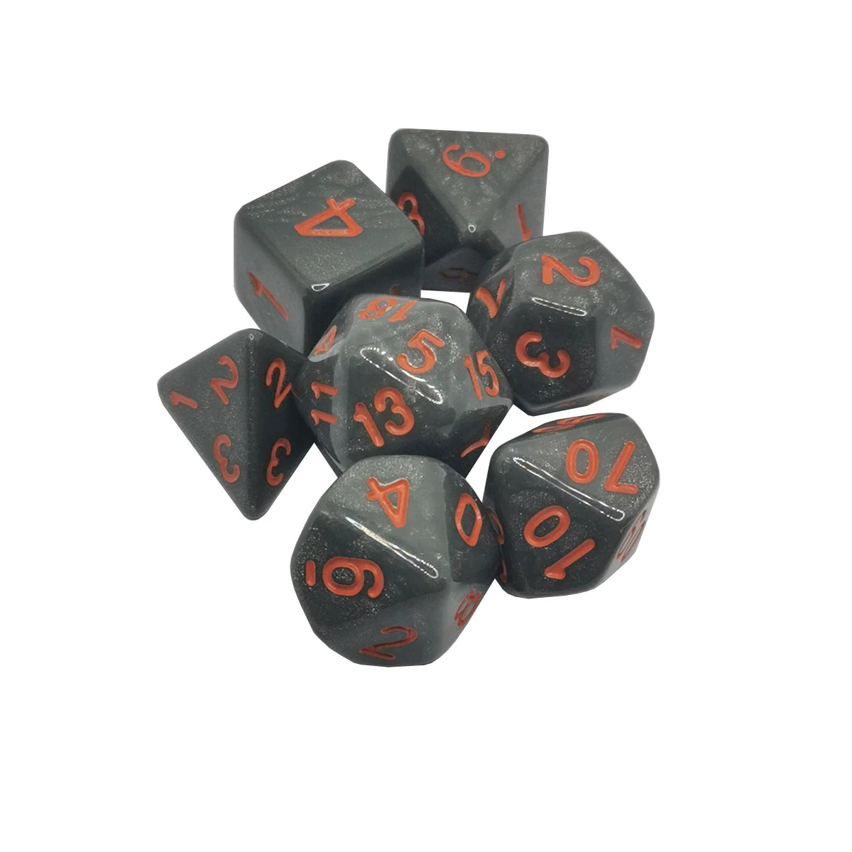 A pile of seven polyhedral dice in black and red colors, used for tabletop role-playing games.