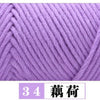 A close-up of purple milk cotton yarn showing a tightly twisted skein.