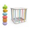 A set of colorful sensory sorting blocks for babies and toddlers, featuring stacked, brightly colored shapes.