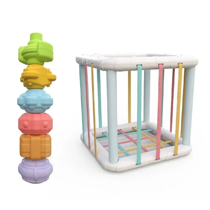 A set of colorful sensory sorting blocks for babies and toddlers, featuring stacked, brightly colored shapes.
