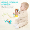 A baby is holding a soft plush toy with crinkle and squeak sounds for attention grabbing.