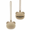 A light beige silicone panda-themed pacifier storage bag with a long strap.