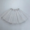 White tulle three-layer tutu skirt for girls with a ruffled waistband