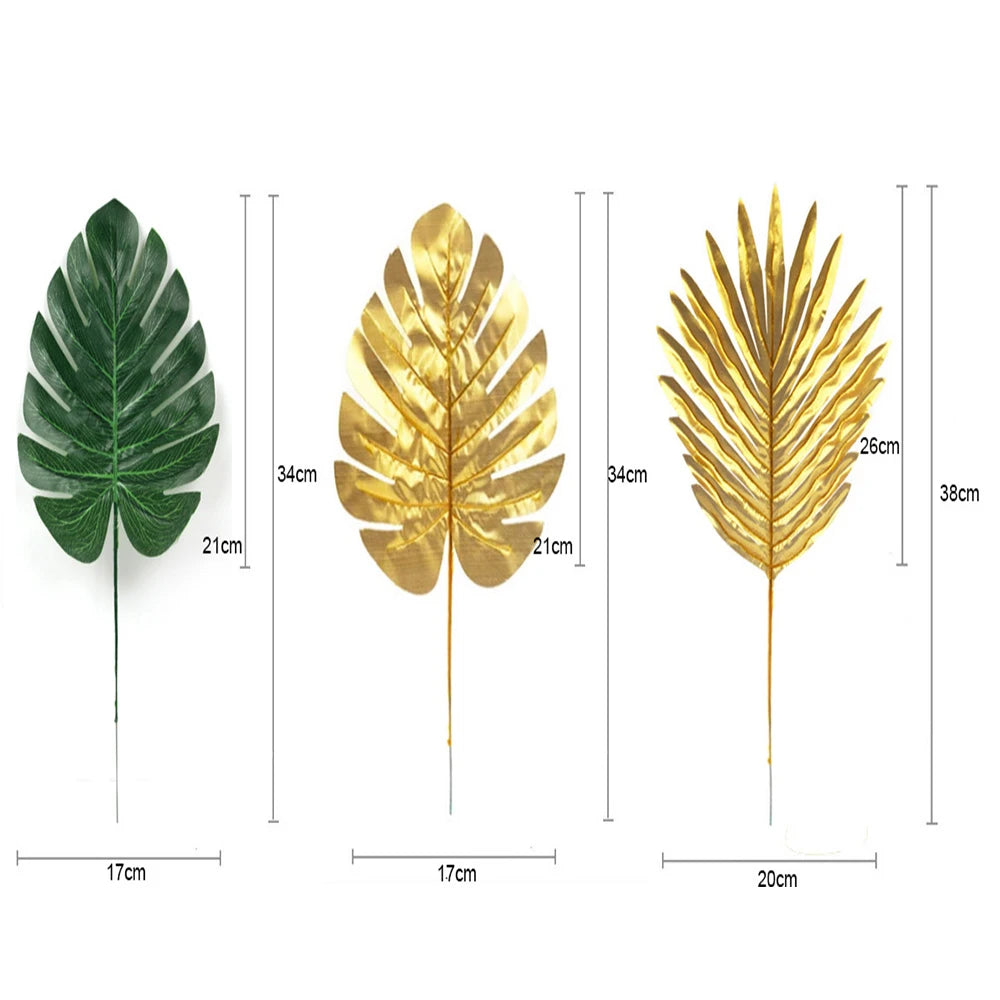 Three artificial tropical palm leaves in various shades of green and gold for party decor