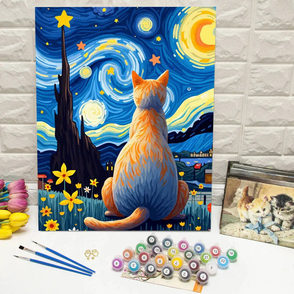 A colorful painting of an orange cat against a starry night sky, part of a DIY paint by numbers kit.