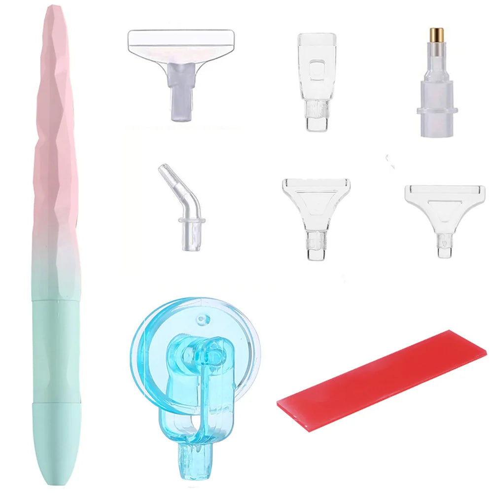 A set of diamond painting tools including a pen, roller tool, and various tips for painting.