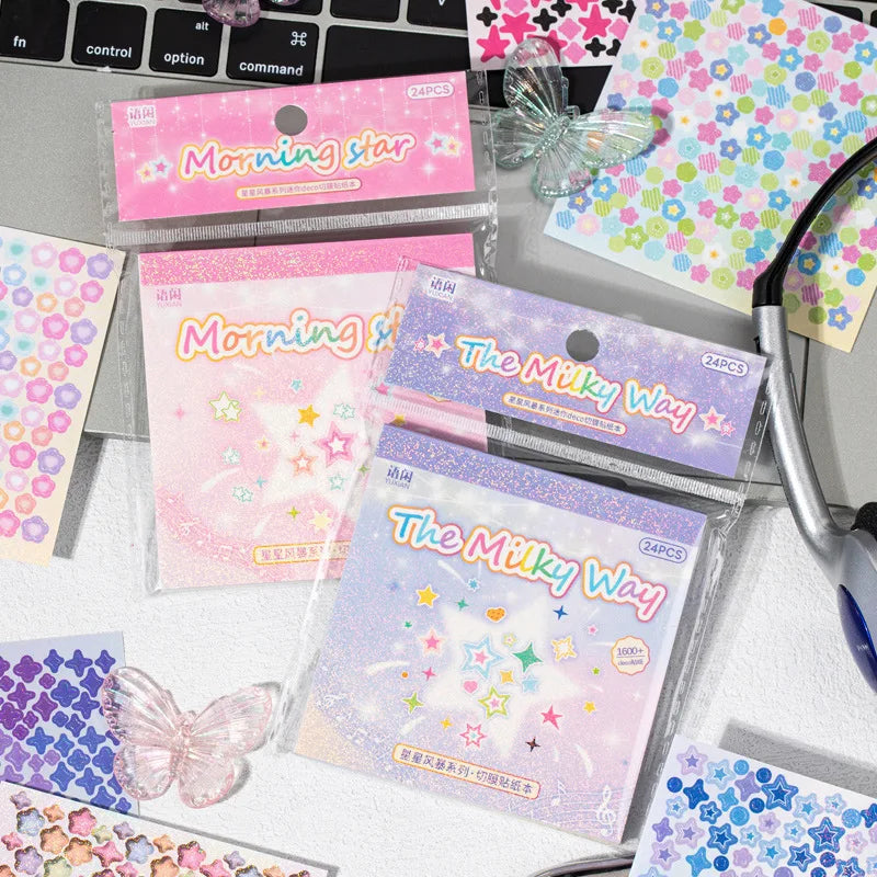 A collection of sparkly pink and purple film stickers in clear packaging featuring 'Morning Star' and 'The Milky Way' designs