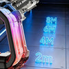 A close-up of an Ice Burst water gun toy with a circular drum, featuring silver and pink accents against a blue background.