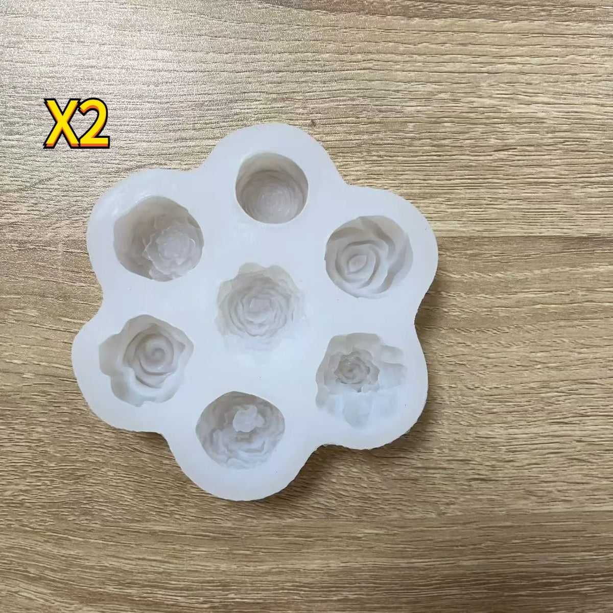 A silicone mold set with multiple flower-shaped cavities for crafting and making