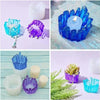Various crystal silicone candle molds in blue and purple colors displayed on a light background.