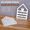 A white silicone mold set for house light sign decoration showing various shapes and dimensions.