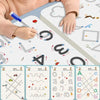 A child is using a reusable tracing workbook with a pen to practice writing and number formation.