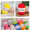 A collection of colorful chenille yarn balls in various shades including yellow, pink, green, blue, and orange.