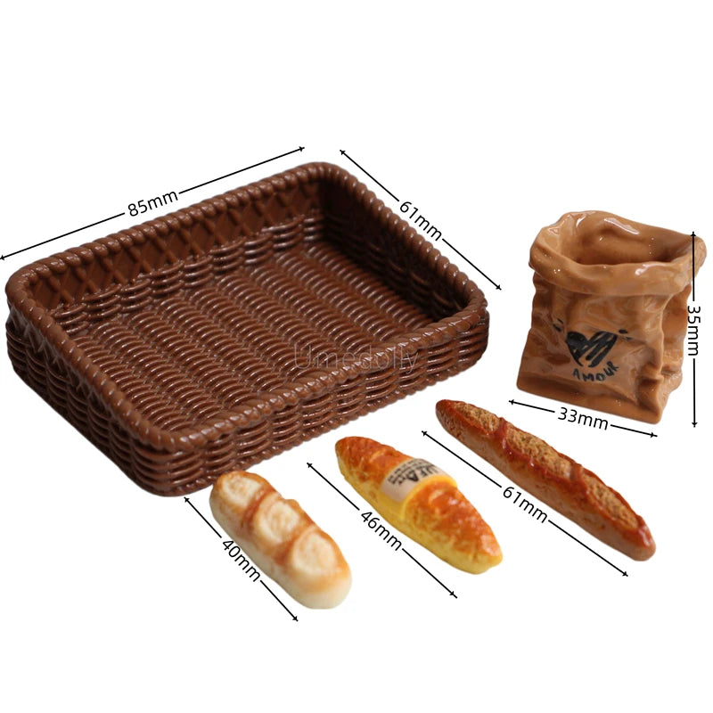 A miniature dollhouse set featuring a brown basket and several baguette-shaped food items.