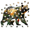 A jigsaw puzzle featuring various bears and animals, including a large bear and many smaller creatures.