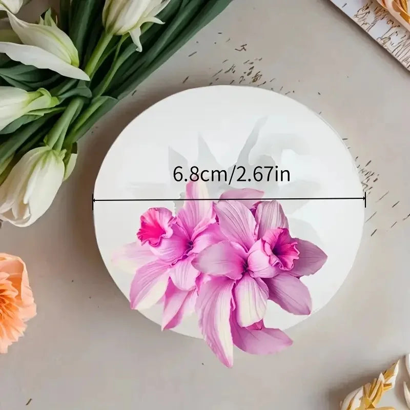 A pink orchid flower is displayed on a white silicone mold with a measurement line.