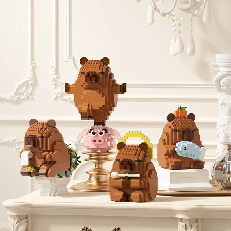 A set of cute capybara micro building blocks featuring various animal figures and accessories.