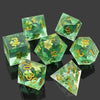 A set of milk white resin dice featuring a black kitten design, arranged on a dark surface.