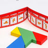A wooden tangram puzzle featuring colored geometric shapes arranged in a triangular formation.