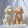 Two fluffy poodle dog silicone candle molds in white and peach colors