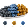 A collection of round silicone beads in various shades including dim gray, mustard yellow, and powder blue.