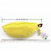 Yellow storage bag for an alphabet spelling game set, shown next to a ruler.