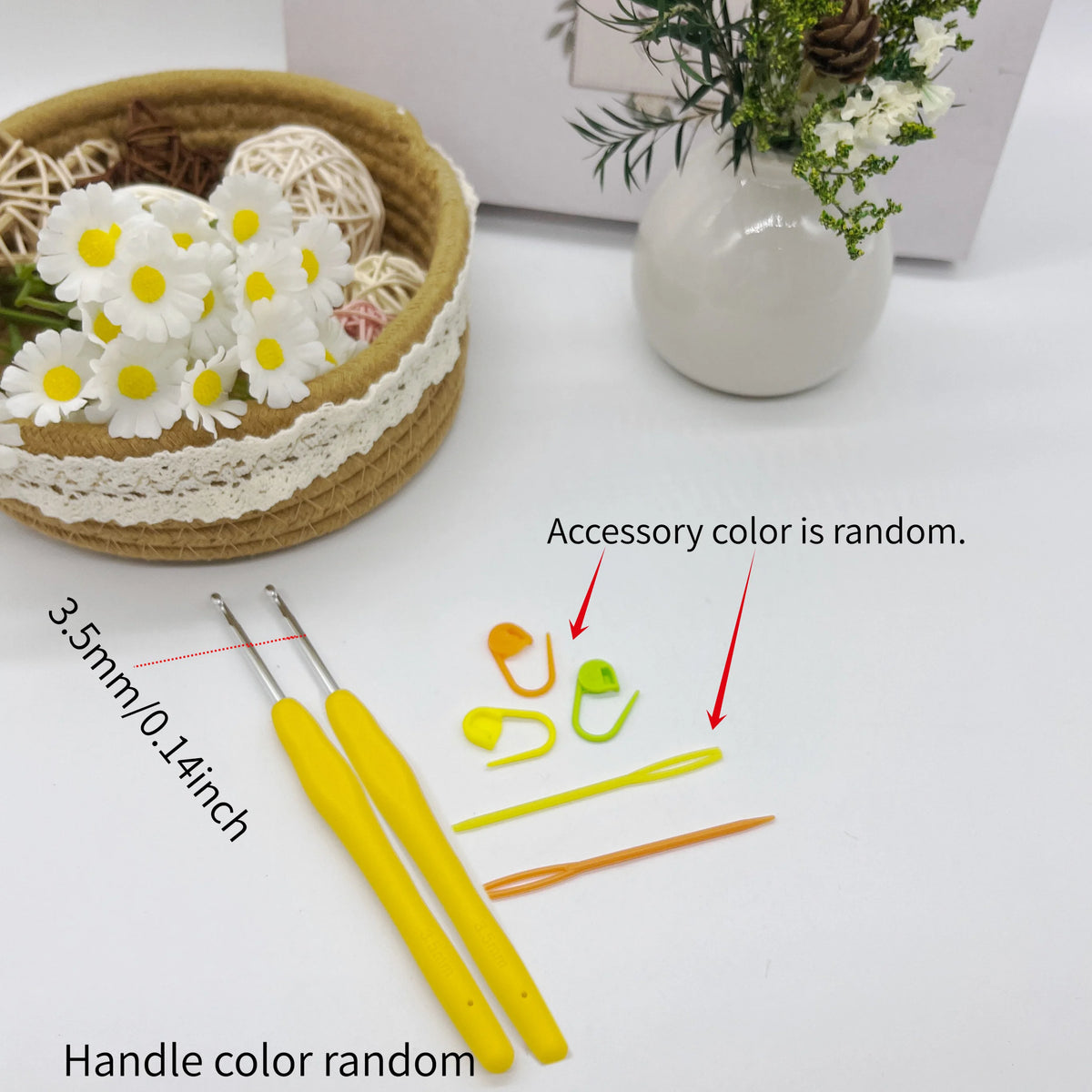 A set of crochet hooks, stitch markers, and needles with various colors displayed next to a woven basket and a white vase.