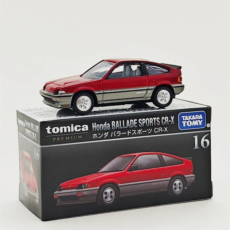 Tomica Honda Ballade Sports CR-X premium die-cast model in red and gray on a box.