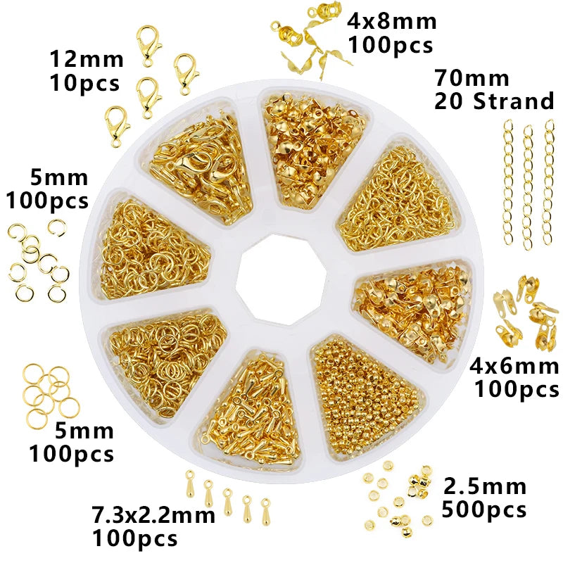 A circular organizer case containing various gold-colored jewelry findings like chains, rings, and jump rings in different si