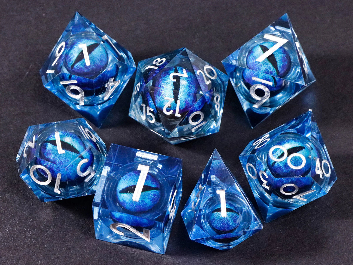 A set of seven blue liquid core resin polyhedral dice for tabletop role-playing games
