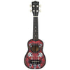 A black acoustic guitar with a red body featuring intricate skull and floral designs.