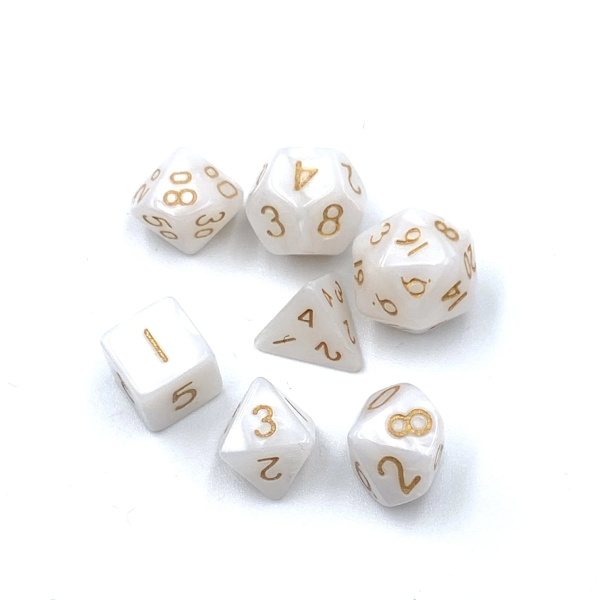 A collection of seven white acrylic dice showing various numbers and dots on a white background.