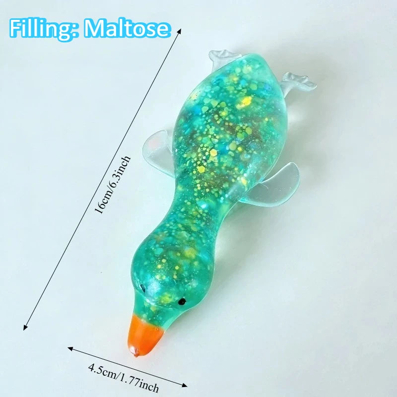 A bright green and yellow squishy duck fidget toy with an orange beak, shown against a white background.