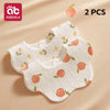 Two white baby bandana bibs with a light orange fruit pattern are displayed on a beige background.