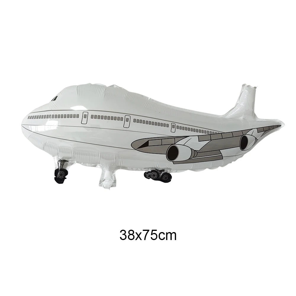 A white foil balloon shaped like an airplane is shown for birthday party decor.