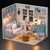 A miniature dollhouse puzzle kit featuring a cozy room with furniture, decor, and window details.