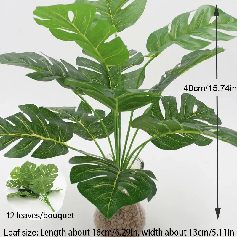 Green faux Monstera palm leaves showing leaf size and quantity for indoor and outdoor decor