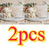 Two white elephant silicone molds used for making candles, soap, and resin crafts.
