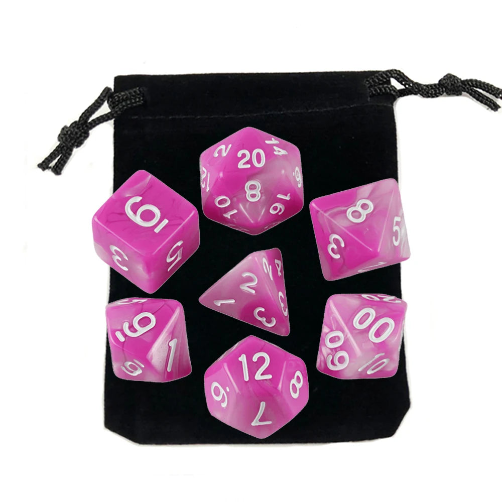 A set of pink and clear polyhedral dice, including a d20, stored in a black fabric bag.