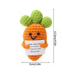 Handmade crochet pocket hug doll shaped like a carrot with green leafy top and an inspirational message