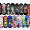 A row of wooden fingerboard decks featuring various UV-printed graphic designs and colors.