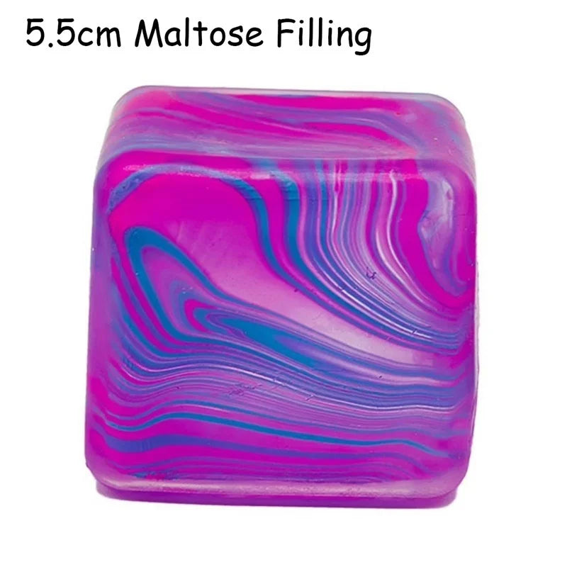 A vibrant, translucent cube toy filled with colorful maltose, featuring swirling shades of pink and blue.