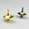 A metal fidget spinner with a smooth, golden-yellow top and disc, showing iridescent colors.