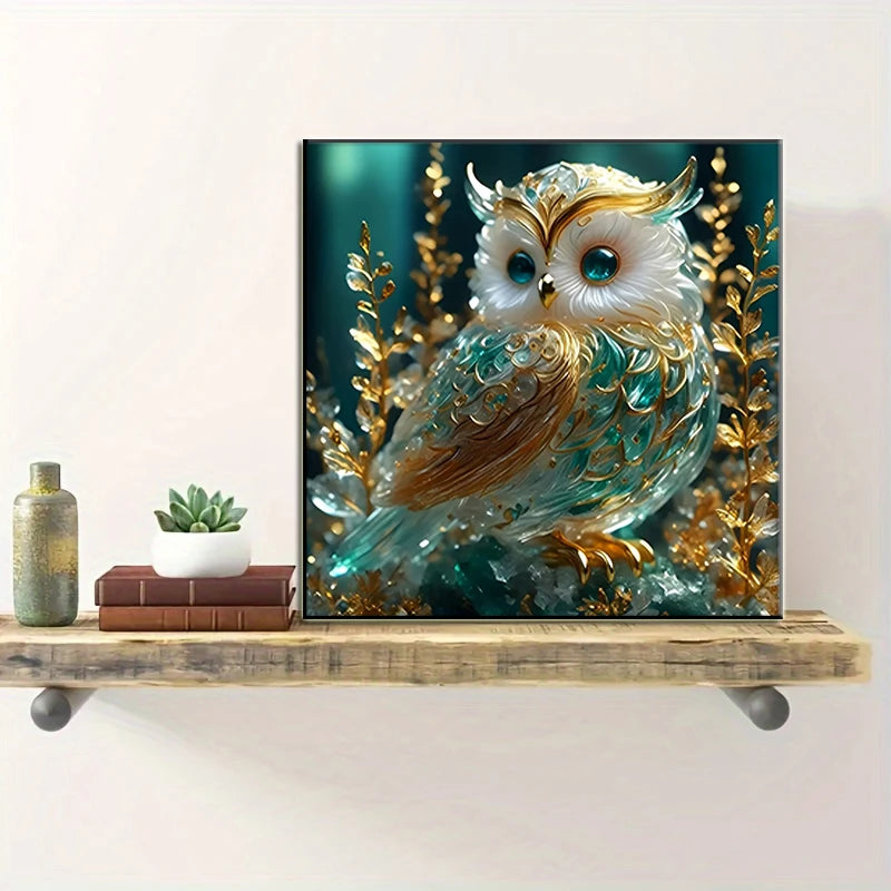 A painting of a majestic owl with golden accents, displayed in a framed print.