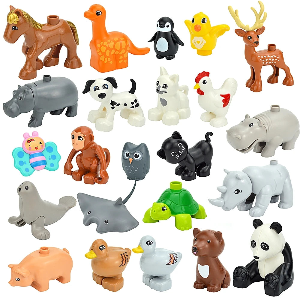 A collection of various zoo animal figures made from large building blocks in various colors and styles.