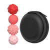 A set of five soft, textured silicone massage balls in shades of red and pink, next to a black magnetic core.
