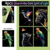 Four glow-in-the-dark scratch art pieces featuring a parrot, a horse, a cat, and another parrot.