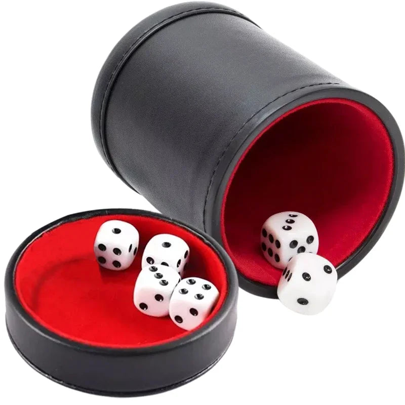 Black leather dice cup with red lining and five white dice for gaming