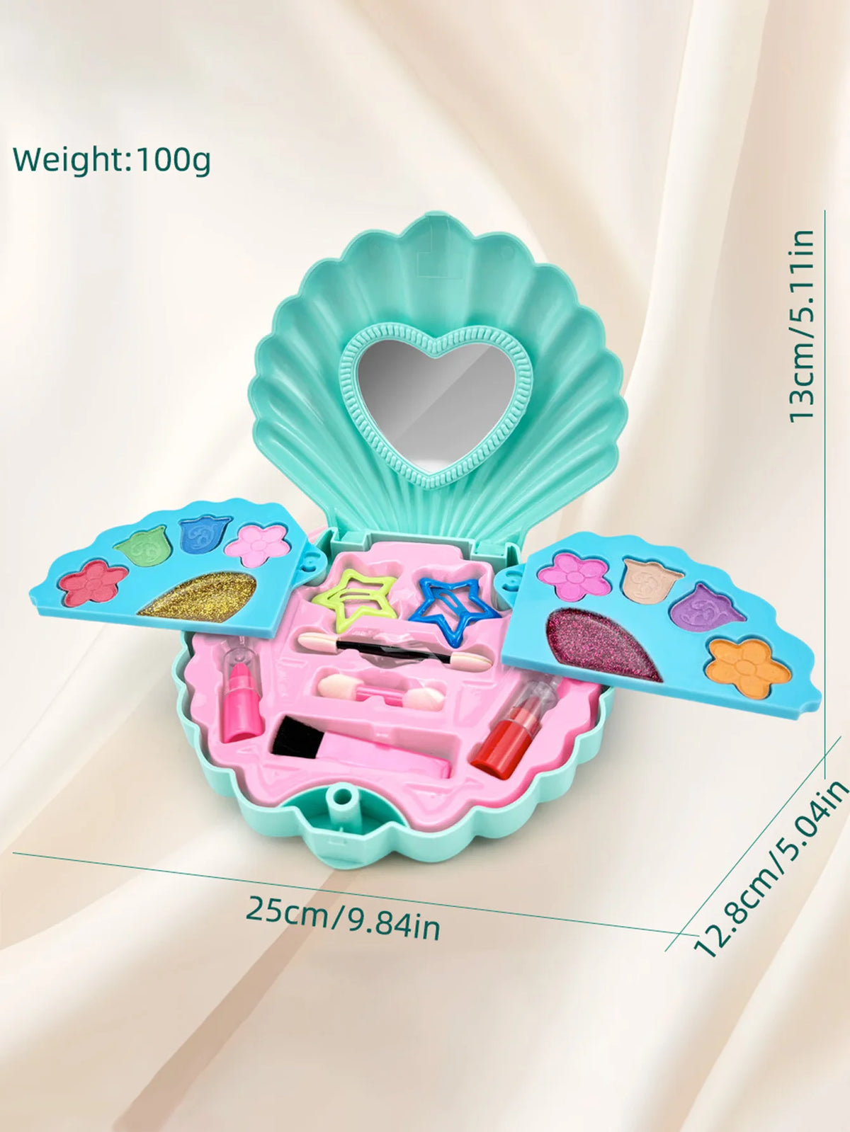 A light blue shell-shaped makeup toy set with a heart-shaped mirror and various colored cosmetic products.