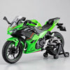 A bright green Kawasaki Ninja motorcycle diecast model with lights and sound displayed on a stand.